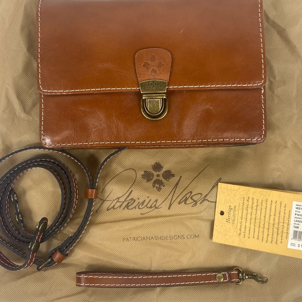 Patricia Nash Lanza Crossbody Organizer
Tan w crossbody strap and wristlet - NWT - Picture 17 of 17